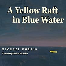 A yellow raft in blue water /